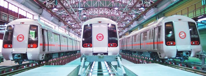 Three Delhi Metro trains at a depot